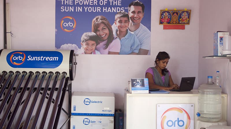 Women behind desk in orb energy outlet